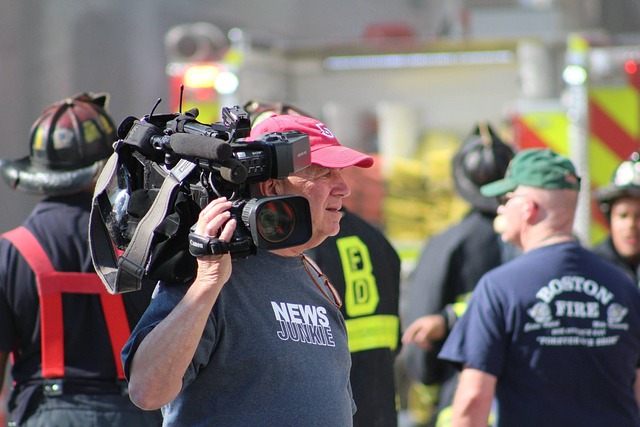 Reporter holding a microphone during a press conference